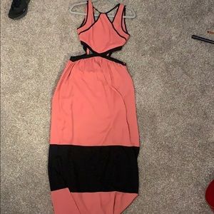 Pink and black dress with cutout sides.